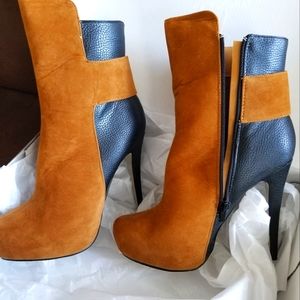 Cognac brown and black leather 4 inch heels.